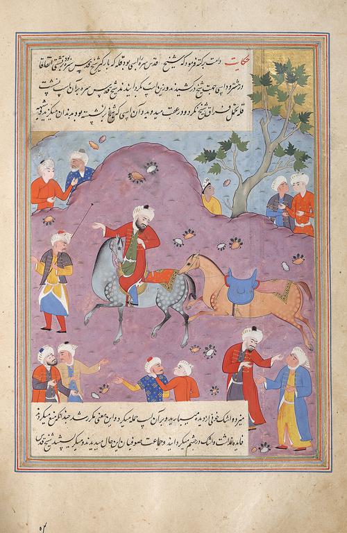 Folio with a captioned painting showing a man riding a grey horse, which is being bitten by a red horse. 12 figures surround the scene, watching or talking to each other. At the top of the painting there is a river and a leafy tree leaning over the riverbank.